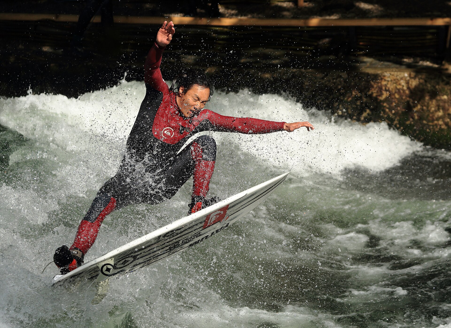 A surfer riding the Eisbach